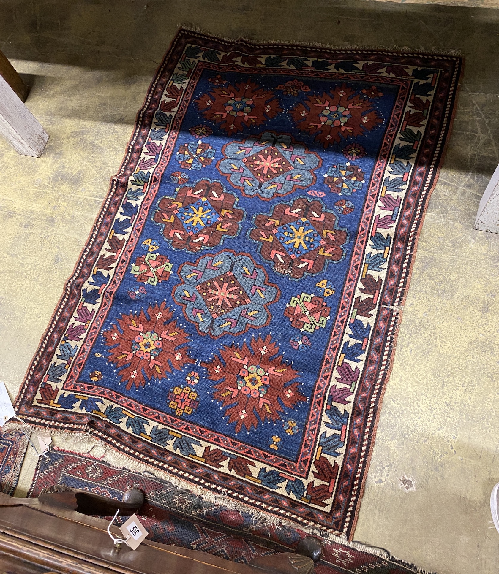 A Caucasian Seychour blue ground rug, 144 x 98cm